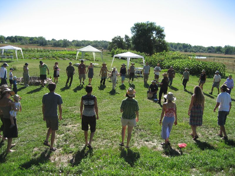 Sandy Cruz leading the opening circle dance
